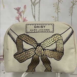 Marc Jacobs Daisy cosmetic Bag with Gold Sequin Bow